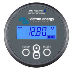 Victron Energy BMV-712 Smart Battery Monitor head unit and 500A shunt with VictronConnect app interface on a smartphone.