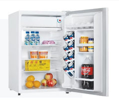 Interior view of Solstice 126L 12V Fridge with can dispenser and glass shelves