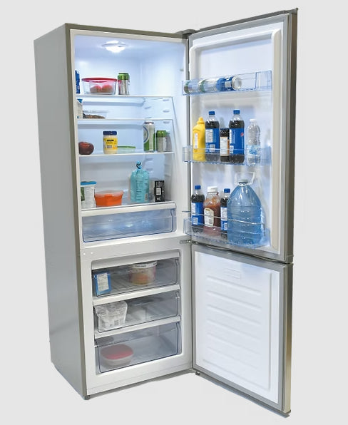 Interior view of Solstice 425L 12V Fridge showing bottom freezer and glass shelves