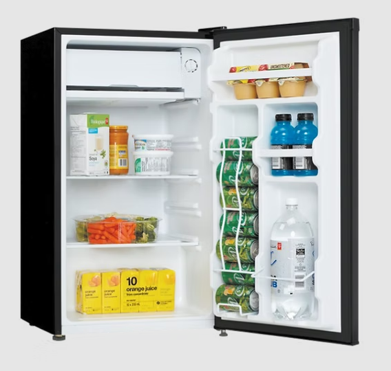 Interior of Solstice 92L 12V Fridge showing can dispenser and glass shelves
